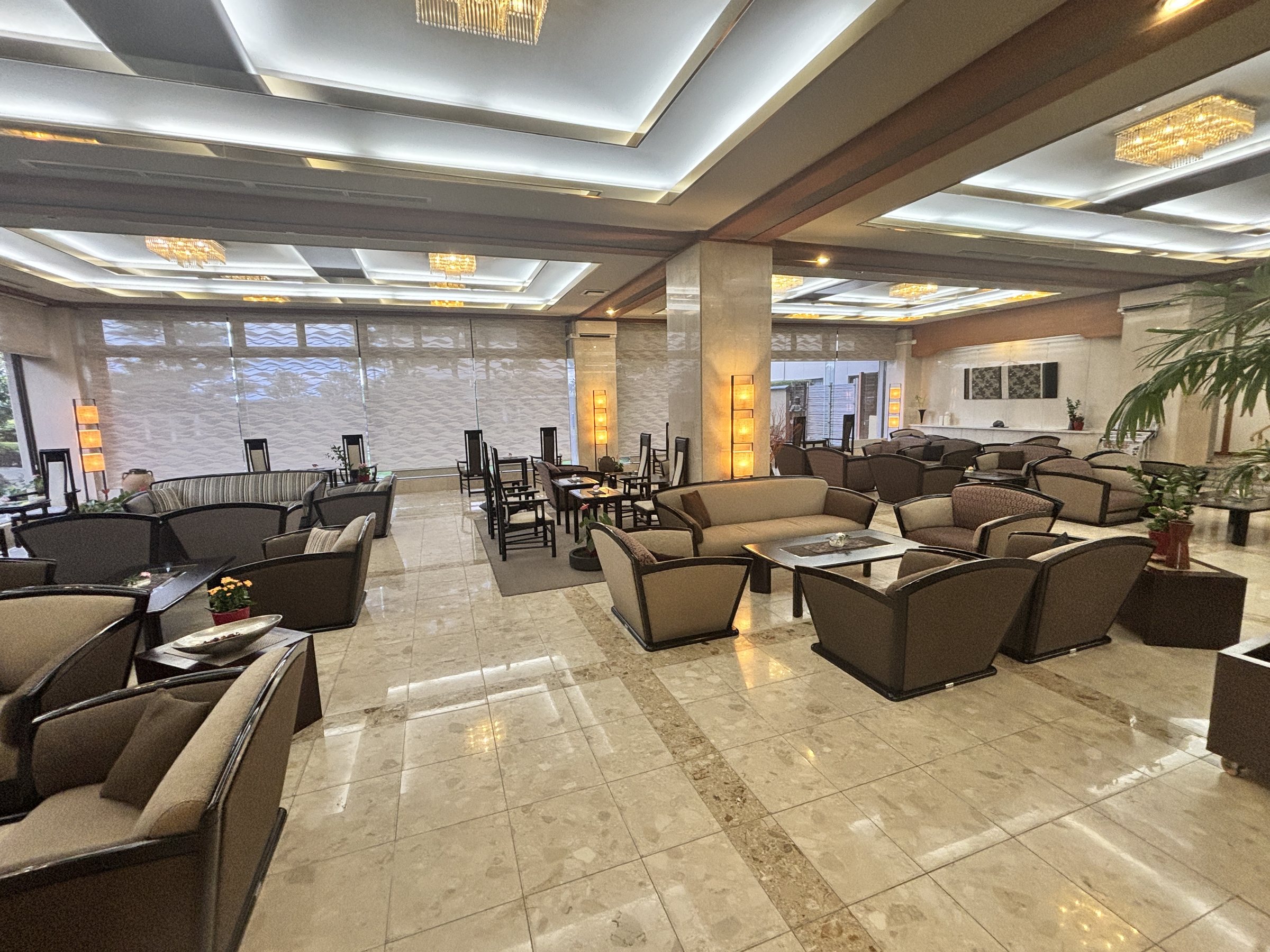 The lobby lounge stretching back toward the windows.