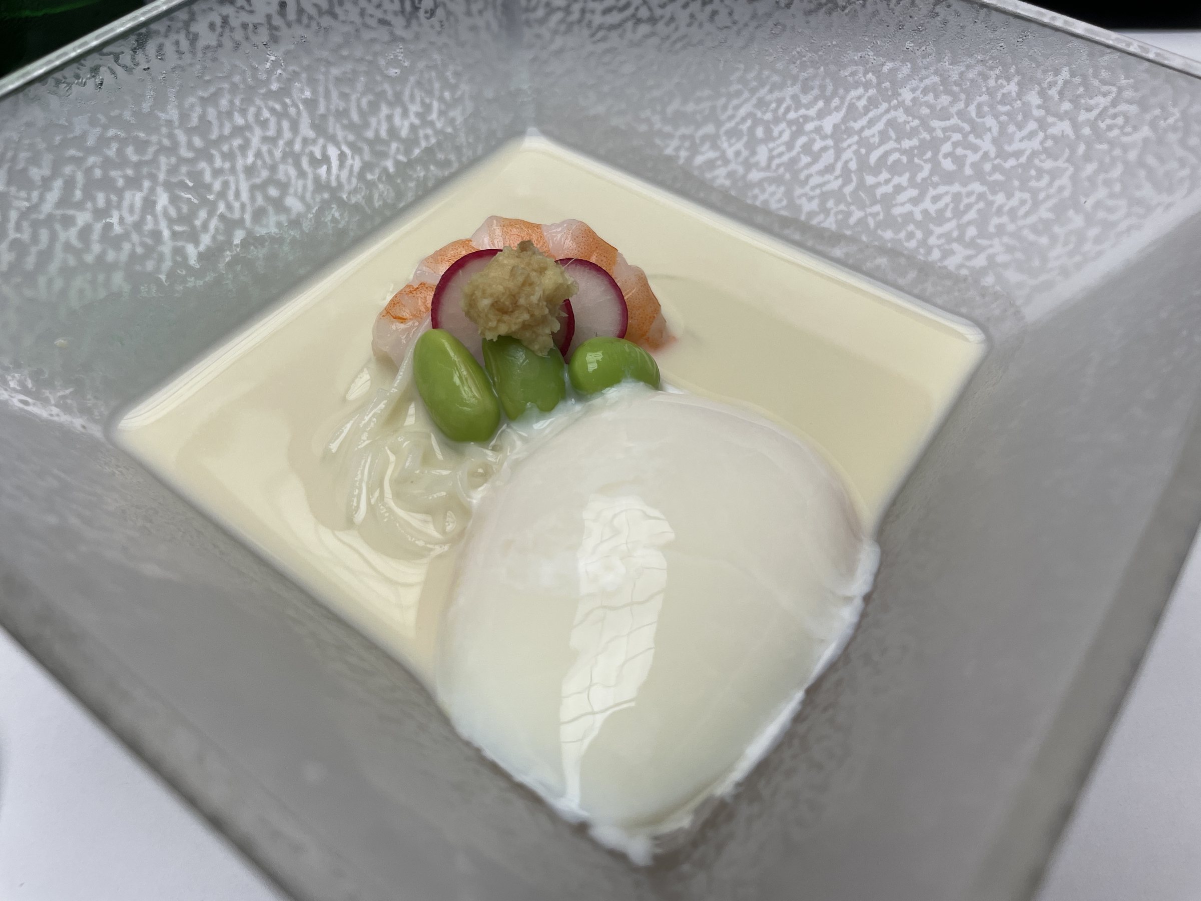 Chilled somen in soy milk with edamame and a soft-cooked egg.